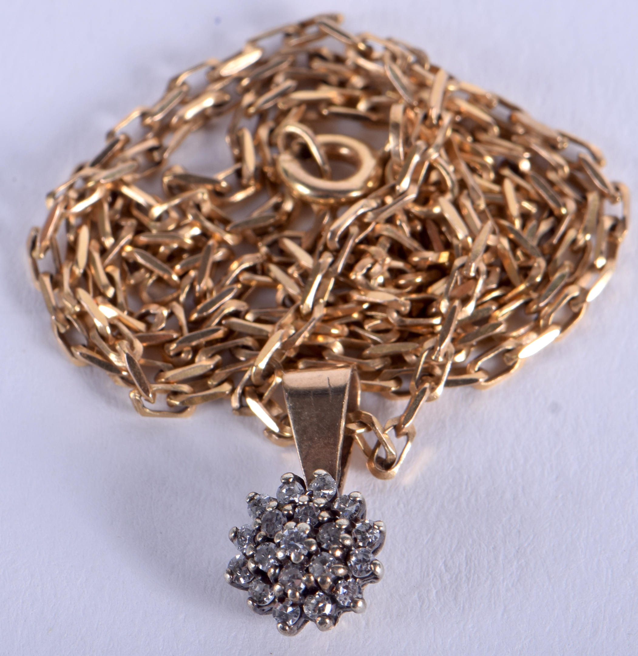 A GOLD AND DIAMOND NECKLACE. 4.8 grams.