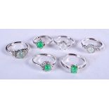 SIX SILVER AND JADE RINGS. (6)