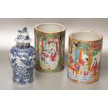 TWO SIMILAR CANTONESE PORCELAIN VASES of plain cylindrical form, painted in famille rose enamels