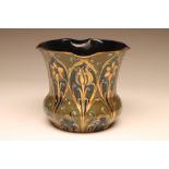 A MACINTYRE MOORCROFT POTTERY FLORIAN WARE CACHE-POT, early 20th century, of baluster form with
