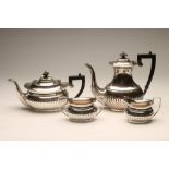 A SILVER FOUR PIECE TEA AND COFFEE SERVICE, maker W R Smily, Sheffield 1975, of semi-fluted oval