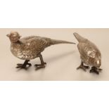 A PAIR OF CHINESE HOLLOW CAST PEWTER PHEASANTS, modelled standing, the cock with remains of red