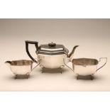 A SILVER THREE PIECE TEA SERVICE, maker Harrison, Fisher & Co., Sheffield 1946, of rounded