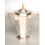 AN ART DECO SILVER TWO HANDLED TROPHY CUP, maker Thomas Bradbury, Sheffield 1937, of flared