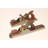AN IRON AND MAHOGANY JOINTING PLANE, 19th century, with brass clamp and square foregrip, owner's
