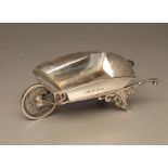 A NOVELTY SILVER WHEELBARROW BON-BON DISH, maker S. Blankensee & Son Ltd., Birmingham 1921, the