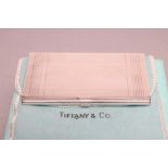 A TIFFANY & CO. SILVER BUSINESS CARD CASE, stamped 925, of plain oblong form with engine turned