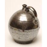 A TERRACOTTA FLAGON, 19th century, of ovoid form with pulled and applied loop handle, in a pewter