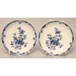 A PAIR OF FIRST PERIOD WORCESTER PORCELAIN SAUCERS, c.1760, painted in underglaze blue with the