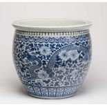 A MASSIVE CHINESE PORCELAIN JARDINIERE of rounded form, painted in underglaze blue with two