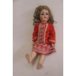 A Kammer & Rheinhardt bisque head walking doll with cry, brown glass sleeping eyes, open mouth and