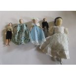 Five wood jointed dolls, all with painted heads and fully dressed, comprising gentleman with