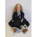 A French Lanternier "Favorite" bisque head doll with fixed blue glass eyes, open mouth and teeth,