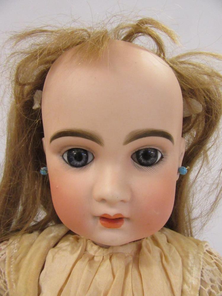 A Jumeau Bebe bisque head doll with fixed blue paperweight glass eyes, open mouth and teeth, pierced - Image 2 of 2