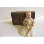 A Kley & Hahn bisque head boy character doll with painted face, moulded hair, composition bent