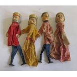 Four puppets with carved painted wood heads, two with wooden feet, depicting male, female, king