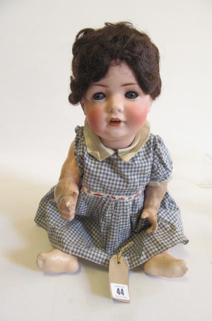 A German "BP" bisque socket head character girl doll, with blue sleeping glass eyes, open mouth