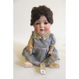 A German "BP" bisque socket head character girl doll, with blue sleeping glass eyes, open mouth