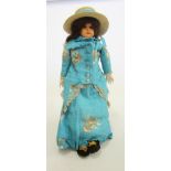 A Bruno Schmidt celluloid shoulder head doll with blue glass sleeping eyes, open mouth and teeth,