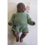 An Armand Marseille bisque head brown "Dream Baby" doll with painted, moulded hair and features,