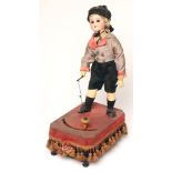 A Simon & Halbig bisque head musical automaton doll, c.1900, with brown glass eyes, open mouth and