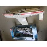 A Sea Ray Sun Dancer 48 radio controlled launch, 17" long, box AF, and a Kyosho Fairwind Yacht,