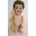 A Kammer & Reinhardt bisque head character Mamma doll, with blue glass flirty eyes, open mouth,