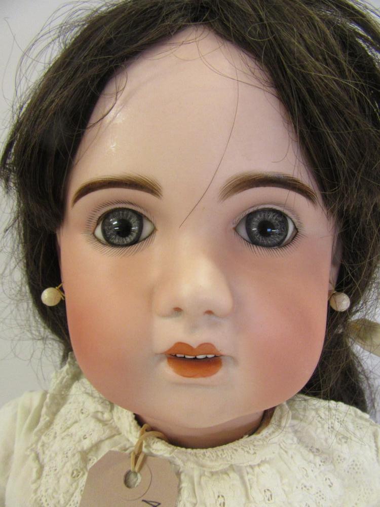A Tete Jumeau bisque head doll with fixed blue paperweight glass eyes, open mouth and teeth, pierced - Image 2 of 4