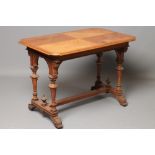 A CARVED OAK AND PARCEL GILT LIBRARY TABLE, late 19th century, possibly French, the shaped and