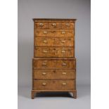 A GEORGIAN WALNUT SECRETAIRE CHEST ON CHEST, mid 18th century, the cavetto moulded cornice over