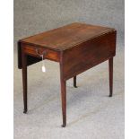 A GEORGIAN MAHOGANY PEMBROKE TABLE, late 18th century, the moulded edged rounded oblong top over