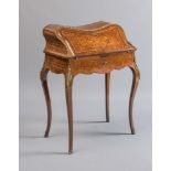 A LOUIS XV STYLE BUREAU DE DAME, 20th century, with parquetry panels and gilt metal mounts, the