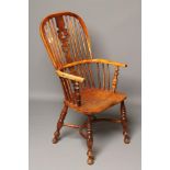 AN ASH AND ELM WINDSOR ARMCHAIR, Yorkshire, late 19th century, of high hooped back form with "