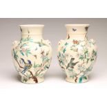 A PAIR OF THEODORE DECK EARTHENWARE VASES, c.1900, of baluster form with moulded mask ring