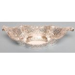 A LATE VICTORIAN SILVER SWEETMEAT DISH, maker Mappin Bros., Sheffield 1900, of lobed boat form