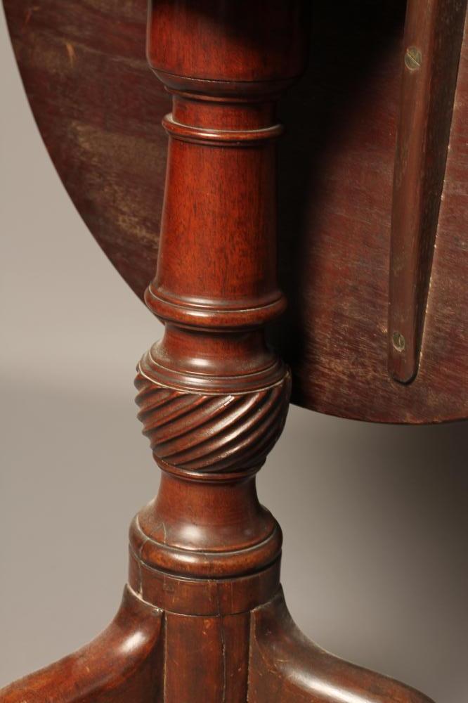 A GEORGIAN MAHOGANY TRIPOD TABLE, late 18th century, the circular tip up top on a ring and wrythen - Image 3 of 3