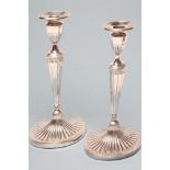A PAIR OF GEORGE III SILVER CANDLESTICKS, maker's mark TD, Sheffield 1785, in Neo-Classical style