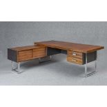 A GORDON RUSSELL ROSEWOOD VENEERED AND EBONISED VINYL DESK similar to the previous lot, 84" X 35 3/