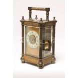 A BRASS CASED CARRIAGE CLOCK, c.1900, the repeater movement regulated by a platform escapement and