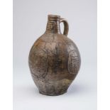 A RHENISH SALTGLAZE STONEWARE BELLARMINE/BARTMANNS KRUG, late 16th century, of ovoid form, the