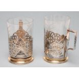 A PAIR OF RUSSIAN SILVER TEA GLASS HOLDERS, post 1958, stamped M, 875, (star enclosing hammer and