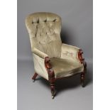 AN EARLY VICTORIAN MAHOGANY FRAMED ARMCHAIR button upholstered in pale green dralon, arched padded