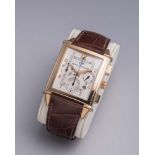 A GENTLEMAN'S 18CT GOLD GIRARD-PERREGAUX "VINTAGE 1945" AUTOMATIC WRISTWATCH, the oblong dial with