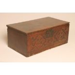 AN OAK BOARDED BOX, late 17th century, the hinged moulded lid with scribed perimeter line, the