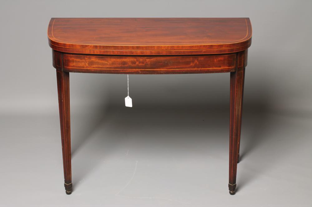 A GEORGIAN MAHOGANY FOLDING TEA TABLE, late 18th century, of D form with boxwood stringing, the