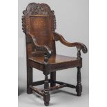 A YORKSHIRE JOINED OAK ARMCHAIR, mid/late 17th century and later, the plain panelled back with