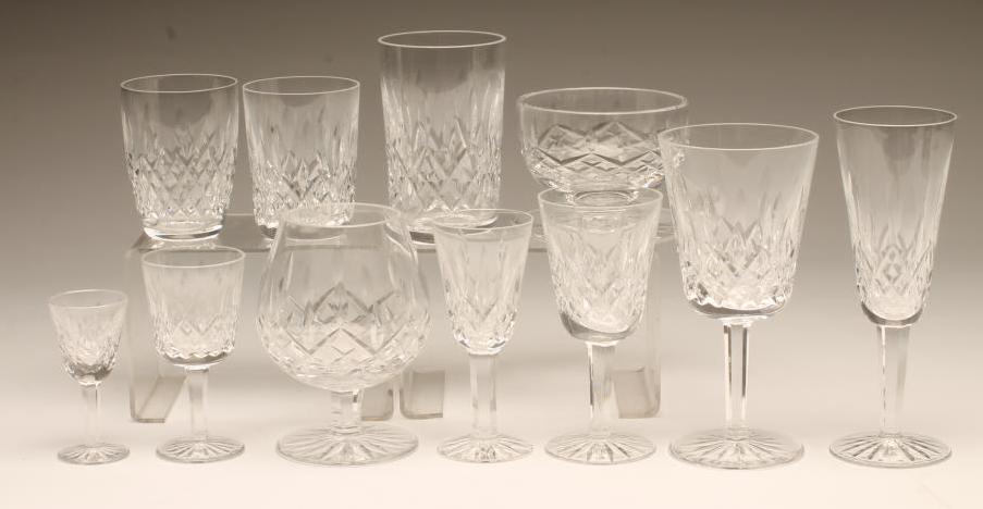 A WATERFORD GLASS TABLE SUITE, modern, in Lismore pattern, comprising eight each hors d'ouevre