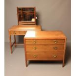 AN ARTS AND CRAFTS STYLE TULIP WOOD PART BEDROOM SUITE, 20th century, comprising dressing table with