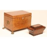 A YEW WOOD VENEERED TEA CADDY, early 19th century, of oblong form with decorative ebony and
