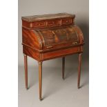 A LOUIS XVI STYLE MAHOGANY BUREAU A CYLINDRE, 20th century, with brass trim, the raised back with